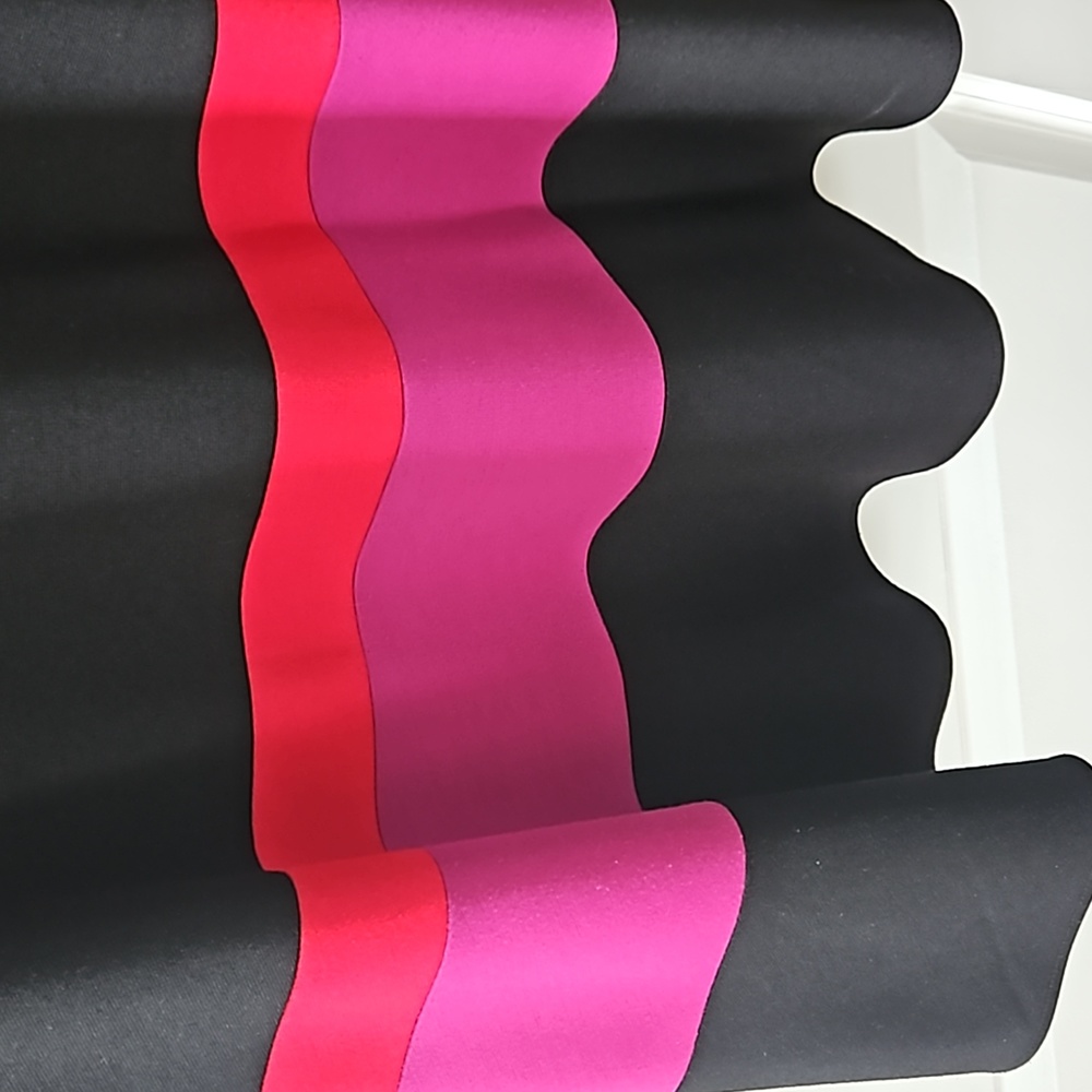 Lined, fabric has great weight/stretch, vivid stripes.